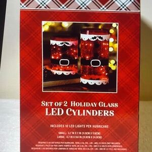 Holly Jolly set of two red glass LED Santa Christmas cylinders